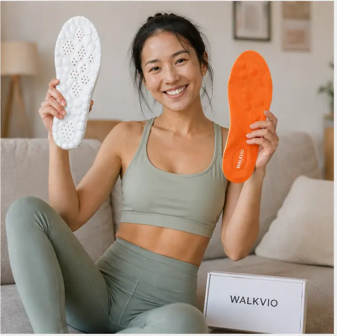 Woman in athletic wear sitting with Walkvio insoles and branded packaging on sofa